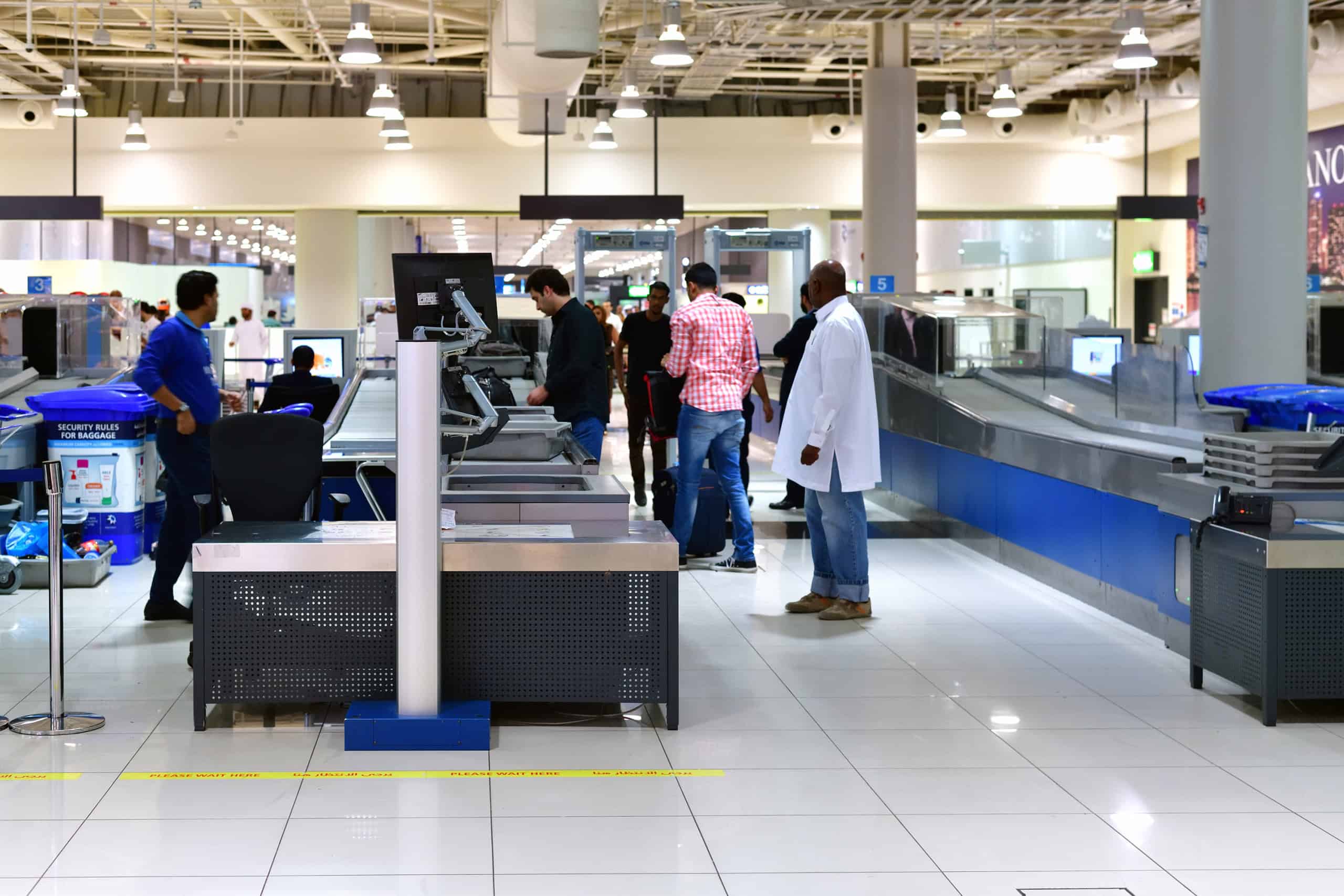 Security at Dubai Airport - pre flight inspection zone